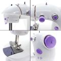 Portable Mini Sewing Machine SM-202. 