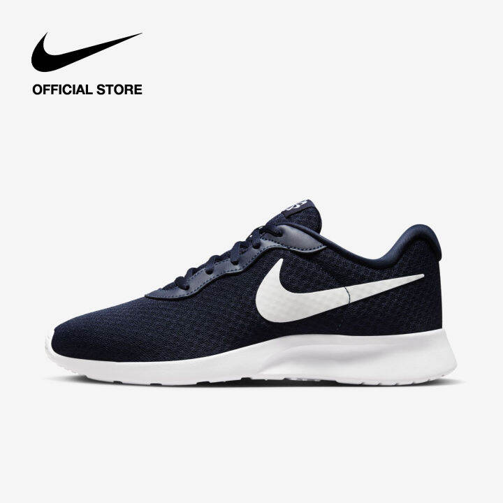 Nike black 2024 tanjun trainers