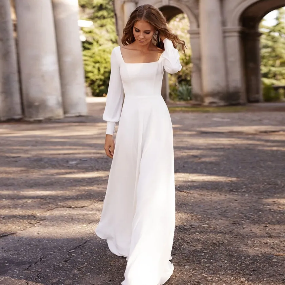 Simple long sleeve hotsell wedding dresses plus size