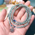 Vòng tay phong thủy đá Mã Não màu xanh cẩm thạch xen kẽ viên Lapis Lazuli cắt giác phong cách đeo quấn 3 vòng phối charm hoa tuyết | Hoa Minh Gem. 