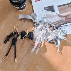 LIHUA ภาษาเกาหลี จี้กระเป๋าเชือกถัก กระเป๋าเสน่ห์ คุณภาพสูง ห้อยกุญแจโบว์ที่มีพู่ ของตกแต่งแขวน หวาน คีย์เชนรูปดาว ของขวัญวันเกิดเพื่อน