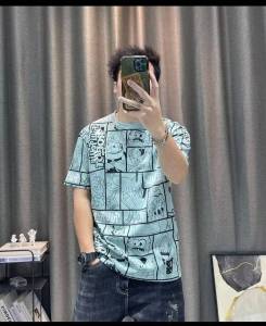 เสื้อยืดแขนสั้นผู้ชายฤดูร้อนสไตล์ฮ่องกงคอกลมหลวมพิมพ์การ์ตูนยอดนิยมอินเทรนด์เสื้อยืดลำลอง