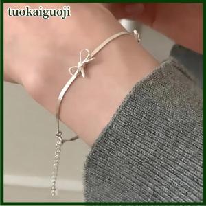 tuokaiguoji สร้อยข้อมือโบว์แฟชั่นแสนหวานสำหรับผู้หญิงเด็กผู้หญิงมีริบบิ้นที่ละเอียดอ่อนติดโบว์รูปกระดูกงูสร้อยข้อมือเครื่องประดับสำหรับงานเลี้ยงของขวัญ