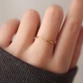 Nhẫn titan nữ 1 mm không gỉ mạ vàng đính đá sang trọng. 
