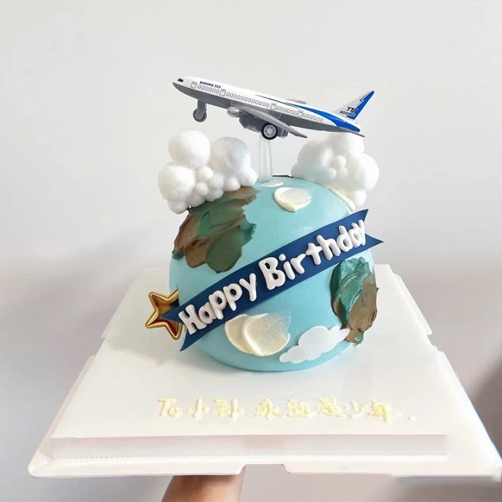 Pilot Themed Cake With Airplane And Clouds