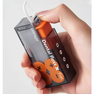 Portable dental floss holder with automatic pop-up storage box and push-to-go disposable floss pick