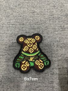 Miếng Sticker Thêu Ủi hình logo gấu cao cấp