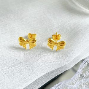 Khuyên tai Nữ titan mặt chiếc nơ xinh cá tính sáng màu không đen gỉ