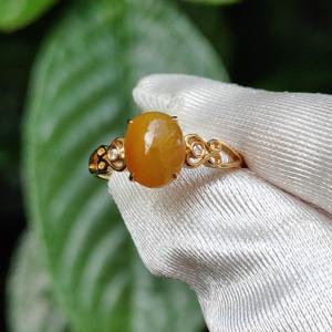 Yellow with a bit reddish Natural Type A Jadeite Jade Cabochon 8.6 * 7 * 3.6 mm set on 18k Gold as Ring adding 2 diamonds with certificate weigh 2.08 grams finger size 16.8 mm (18kring13)