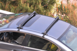 Roof rack cross bar universal gutterless
