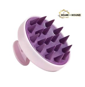HOME + HOUND Silicone shampoo brush with spiked bristles for scalp massage and lathering.
