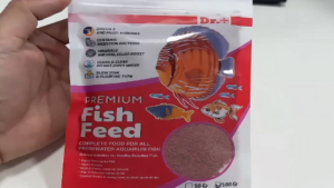Thức ăn cá cảnh thuỷ sinh cá biển tăng màu tăng miễn dịch Dr+ Premium Discus Bits Colour gói 100g