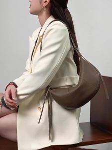 Túi xách nữ da bò lớp đầu tiên kiểu bánh sừng bò đeo chéo túi bánh bao mẫu mới da thật phong cách độc đáo đeo vai tiện dụng đi làm màu trơn da mềm.