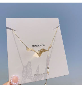good 99918K gold Fashion personality three butterfly hollow pearl titanium steel necklace N8068