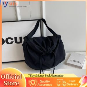 Fashionable Womens Crossbody Bag with Adjustable Strap and Drawstring Design Suitable for Travel Shopping and Daily Use in Trendy Styles