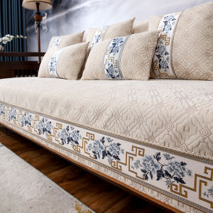 High-grade Chenille Jacquard Sofa Cushion Non-slip Sofa Towel Cushion L-shaped Imperial Concubine Chair Sofa Backrest Cushion. Blue patterned with white and gold trim set on wooden floor.