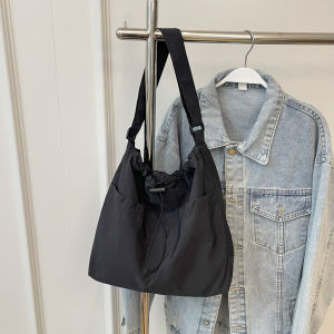 Adjustable Strap Drawstring Crossbody Bag Black Nylon Lightweight for Commute & Casual