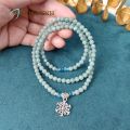 Vòng tay phong thủy đá Mã Não màu xanh cẩm thạch xen kẽ viên Lapis Lazuli cắt giác phong cách đeo quấn 3 vòng phối charm hoa tuyết | Hoa Minh Gem. 