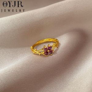 Nhẫn OYJR chất liệu titan không gỉ sét vàng 18K mặt cỏ ba lá đính kim cương màu tím cho nữ
