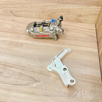 Heo dầu Brambo 4 piston kèm pad trước Vario/Click/Vision đĩa 260/267mm