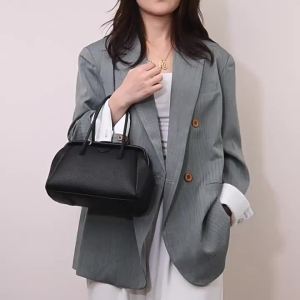 Túi xách tay nữ mẫu mới thời trang đơn giản dung tích lớn túi đeo chéo đi làm túi mẹ trung niên thanh lịch.