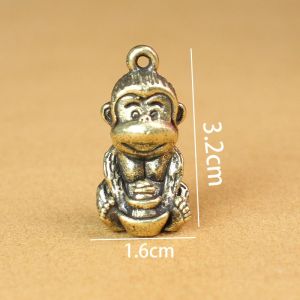 Tượng Nhỏ Phong Thủy Bằng Đồng Kiểu Dáng Khỉ Ôm Vàng  (Kích Thước: 3.0 x 1.6cm)