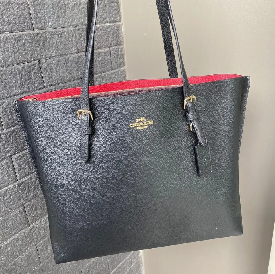 Coach black tote with red outlet lining