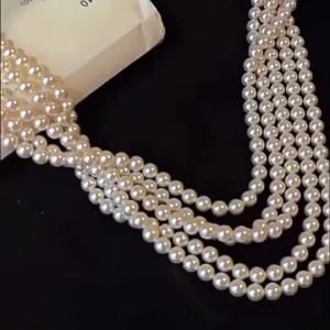 Shijia pearl necklace for women niche light luxury design high-end simple and elegant clavicle chain sweater chain jewelry 2026