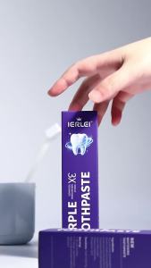 Cross-border color correcting toothpaste cleans teeth whitens and brightens removes yellow stains cleans yellow teeth freshens breath purple essence