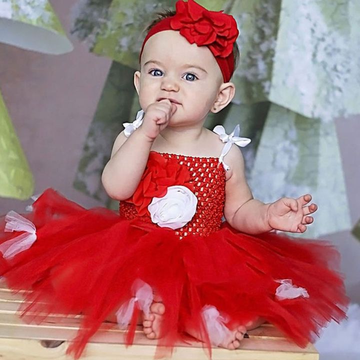 Cute baby girl deals in red frock