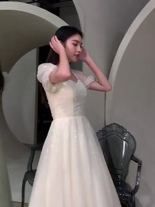 Váy Dạ Hội Thiểu Số Màu Trắng 2024 Phong Cách Mới Tiên Khí Chất Dự Tiệc Cao Cấp Dài Lễ Phục Chủ Nhà Họp Thường Niên Váy Nữ Mùa Thu