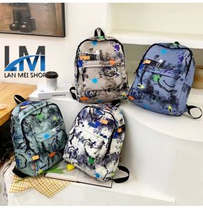 LM SHOP[จัดส่งจากกรุงเทพฯ]กระเป๋าเป้เด็กผู้หญิงรุ่นใหม่ ลายพรางทันสมัย กระเป๋านักเรียนนักเรียนสุดเก๋ เป้พิมพ์ลายกราฟฟิตี้ มี 4 สีให้เลือก