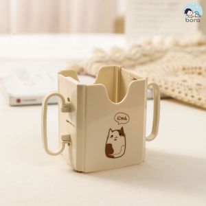 Hộp đựng sữa hộp có quai cầm giúp bé tự uống sữa hộp dễ dàng