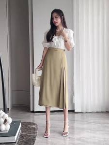 AMMIN 2024กระโปรงยาวปานกลางดีไซน์แบบจีบมีซิปเอวสูงสำหรับฤดูใบไม้ผลิและฤดูร้อนกระโปรงคนเดินทางทรงเอแบบไม่สม่ำเสมอ