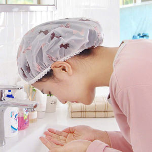 Nón nilông trùm tóc khi uốn duỗi nhuộm hoặc hấp tóc tại nhà (nón trong suốt họa tiết chấm bi đỏ)