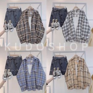 Áo sơ mi nam nữ kẻ sọc 2 túi lệch phối tay bồng trẻ trung năng động/ Áo sơ mi cổ bẻ tay dài dáng suông ulzzang - kudoshop