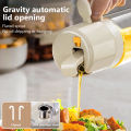 2 in 1 Oil Sprayer Bottle 550ML Gravity Auto Open&Close Oil Dispenser Kitchen Household Leakproof Sauce Bottles. 