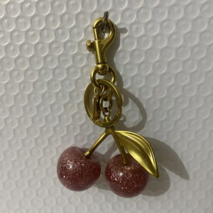 Coach official store new bag accessories Cherry key chain pendant Size: Approximately 12cm x 6cm