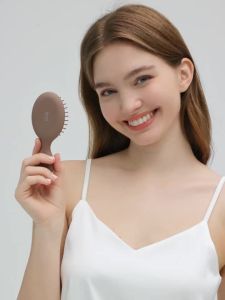 RHOSHair Brush for WomenMen and Kids-Travel Size Hair Brush for PursePocketbackpack-Small Cushion Paddle Brush with Soft Bristles-Detangler Brush for All Hair Types(1 Pack-Beige)