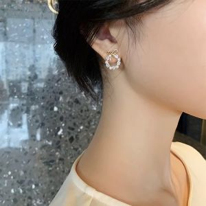 good 999 Fashional Temperament GOLDEN Bow pearl zircon design Earrings ES6098