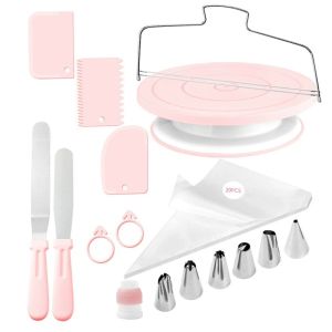 Pink green cake decorating set with turntable spatulas icing tips piping bag and accessories.