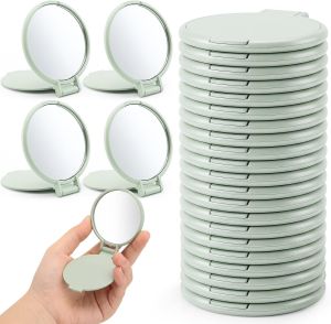24 chiếc gương trang điểm nhỏ gọn màu xanh lá cây kiểu dáng tròn dễ mang theo phù hợp cho phụ nữ có thể gấp lại dùng làm phụ kiện trang điểm khi đi du lịch làm quà tặng cho các buổi tiệc tốt nghiệp hoặc tặng đồng nghiệp kích thước 28 x 24 inch.