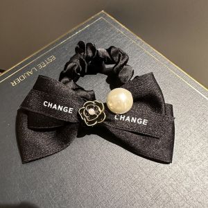 เชือกผมโบว์ เชือกผมมุก Camellia Headwear ยางหางม้าระดับไฮเอนด์