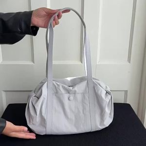 lulu Womens shoulder bag 2025 New bag commuter tote bag yoga bag hand-held gym bag
