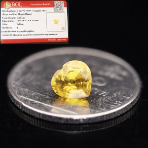 พลอยบุษราคัมรูปทรงไข่สีน้ำทองบางกะจะ(Yellow Sapphire)หนัก 1.22 กะรัต พลอยแท้ ขุดค้นพบที่บ่อบางกะจะ จ.จันทบุรี