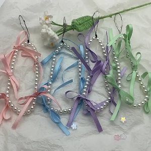 กระเป๋าแขวนประดับโบว์ริบบิ้นแสนหวานประดับมุกเครื่องรางลูกปัดสายพวงกุญแจสำหรับผู้หญิงเด็กผู้หญิง