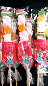 CHRISTMAS GIVEAWAYS GUMMIES/MALLOWS on stick. RANDOM DESIGNS ONLY