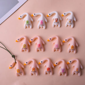 ZEEMIN ใหม่ UV เปลี่ยนสีเป็ดย่างในรถจี้รถพวงกุญแจโทรศัพท์มือถือเด็กสร้างสรรค์เป็ดย่างสามปี