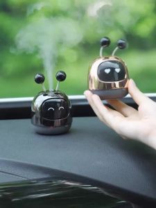 智能车载车薰车内自动喷雾香薰机器人汽车装饰摆件古龙桂花味Automatic spray aromatherapy robot in smart car car car decoration antique osmanthus flavor