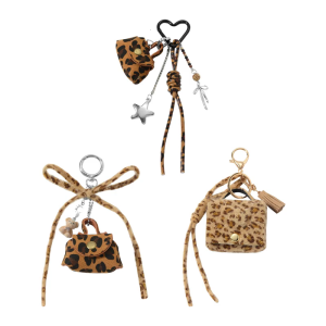 Animal Print Leather Keychain Accessory With Bowknot Detail And Secure Storage Compartment For Essential Key Holder